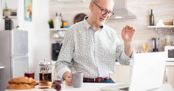 Older Man In Kitchen Shutterstock 1809088861